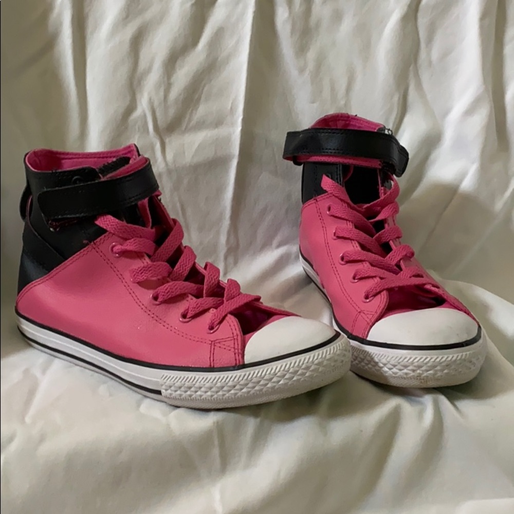 Pink and black leather Converse high tops
